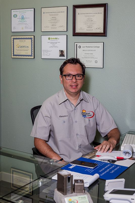 Christian from Christian HVAC at his desk